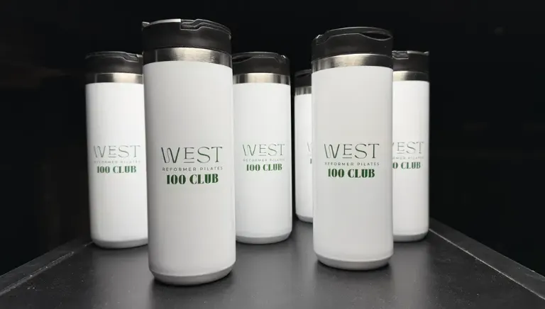 West Reformer Pilates 100 Club bottles